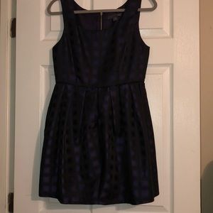 Purple and Black dress. Medium Length. Never worn.